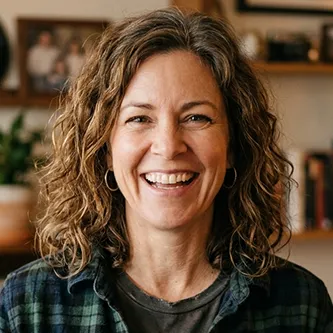 A happy customer headshot, middle aged european woman